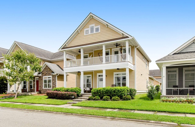 Charming, immaculate coastal home with furnished porches, AC, & washer/dryer