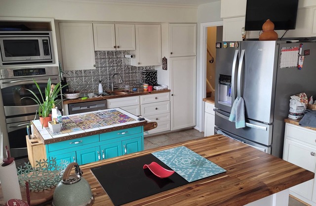 Cheerful 4-bedroom home with backyard and pet friendly.