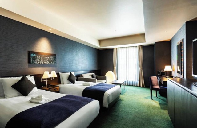 Classy Twin hotel in welcoming Taito City with AC, fitness room, WiFi