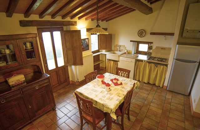 Comfortable apartment with garden in an old farmhouse with swimming pool