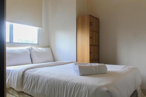 Comfy and Best View 2BR at Serpong Greenview Apartment By Travelio