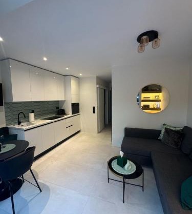 Cosy apartment with shared pool and garden