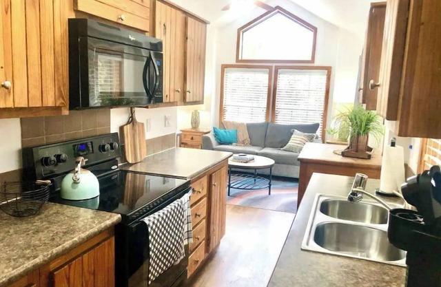 Coyote cabin in 2 acre boutique tiny home resort with pool!