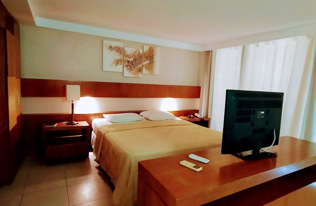 Cozy apartment with views of Morro do Careca.