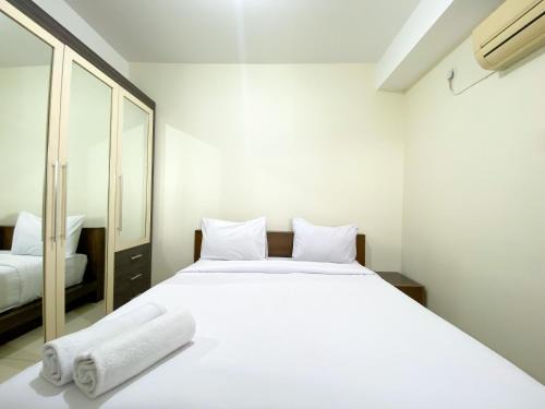 Cozy Designed 2BR at Metropark Condominium Jababeka Apartment By Travelio