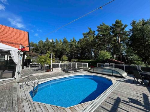 Cozy Stay near Stockholm with Pool and BBQ access