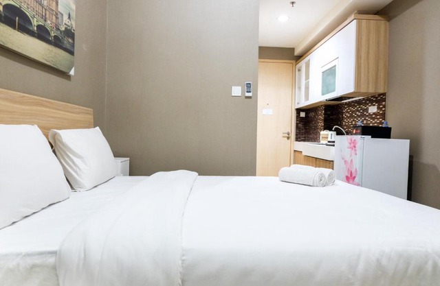 Cozy Studio Tree Park Apartment near ICE BSD By Travelio