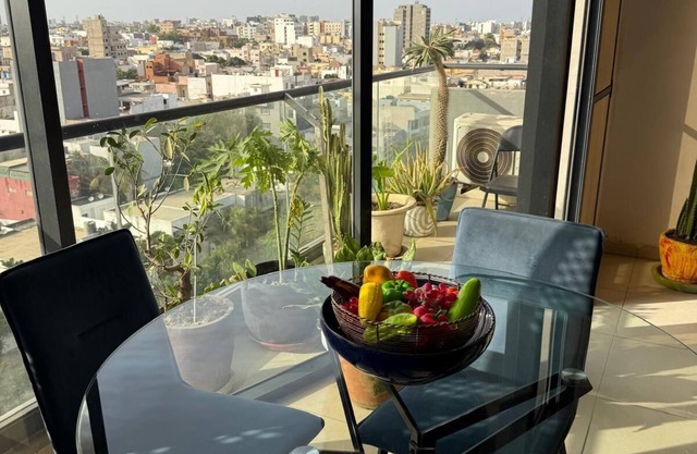Curator’s Artistic Retreat Balcony w Breathtaking Views of Dakar WiFi Safe
