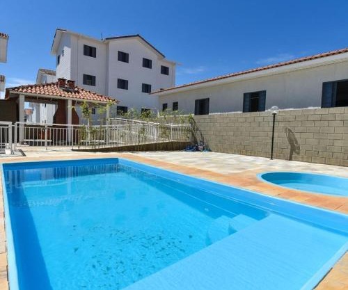 D01 Apto com estacionamento, piscina e churrasqueira