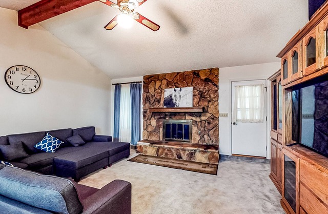 Dog-friendly home with a wood-burning fireplace, board games, W/D, and patio