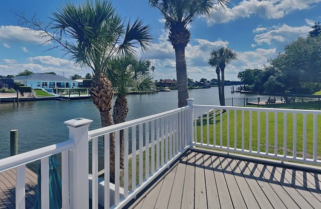 Dolphin View Oasis | Spacious Pet-Friendly Canal-front Home with Game Room+ Dock
