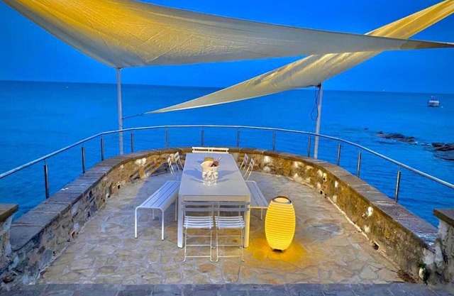 Double waterfront villa with private beach