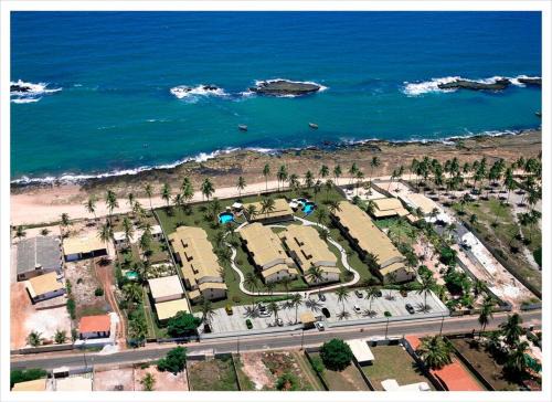 Duplex Arembepe, beira mar, piscina i wifi