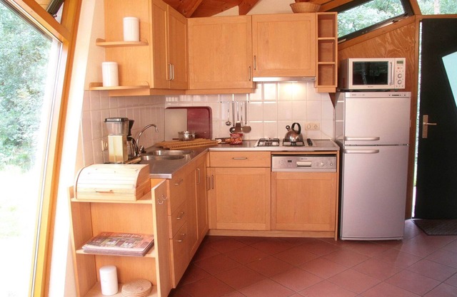 Eco holiday home with wood stove, in a holiday park in the middle of nature