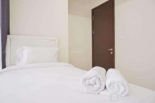 Elegant and Spacious 3BR Menteng Park Apartment By Travelio