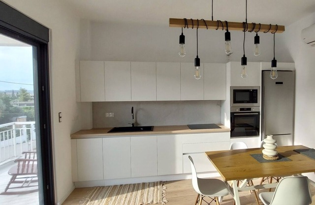 Elegant summer residence with big balcony and garden. Can host 8-10 adults.