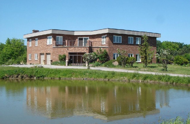 Embrace Spring in style on 25 acre of land with indoor heated swimming pool!