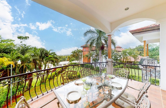 Enchanting & tropical escape with pool, spacious balcony, W/D, & amazing views