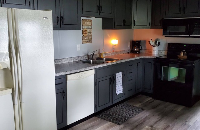 Enjoy this 2 bedroom, 1 bath, cozy lake side house located on Lake Onalaska.