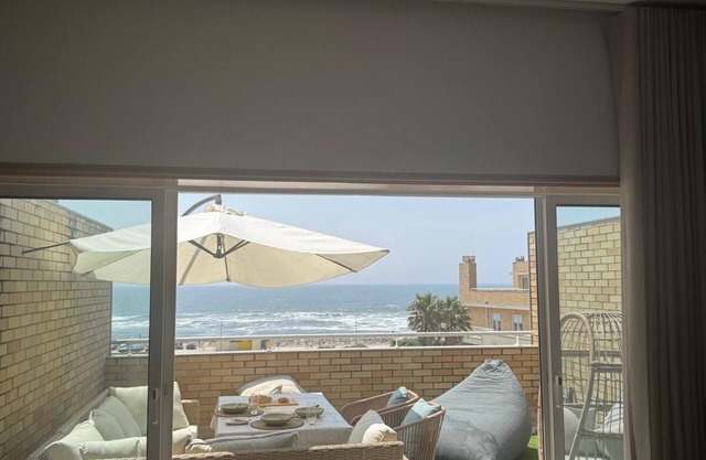 EXCLUSIVE BEACHFRONT APARTMENT