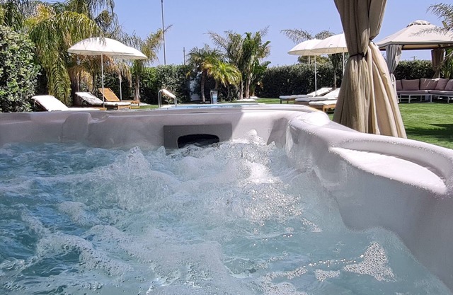 Exclusive Villa with saltwater pool and Jacuzzi hot tub near the sea.