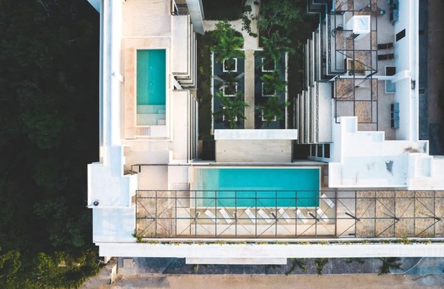 Experience true luxury in this stunning two-bedroom condo in Tulum