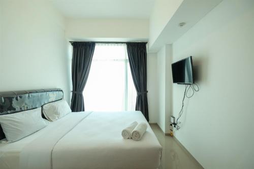 Fabulous Tree Park City Cikokol Studio Apartment near Shopping Mall By Travelio