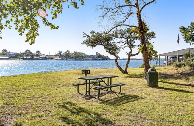 Fantastic home near Lake LBJ with a large backyard, hot tub, grill, & patio