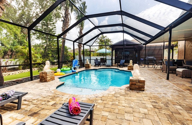 Free heated pool at Apollo Beach gazebo grill pool table games