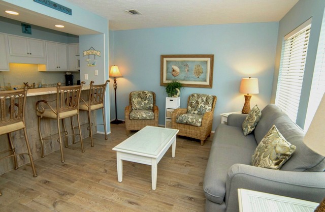 Freshly updated beachfront condo with stunning views. Sleeps 4. Onsite Pool.