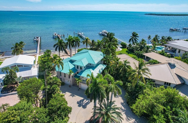 Gorgeous 4 bedroom 3 bath open water pool home