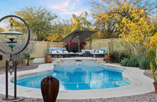 Gorgeous desert escape with a heated pool, fenced yard, washer/dryer, & AC