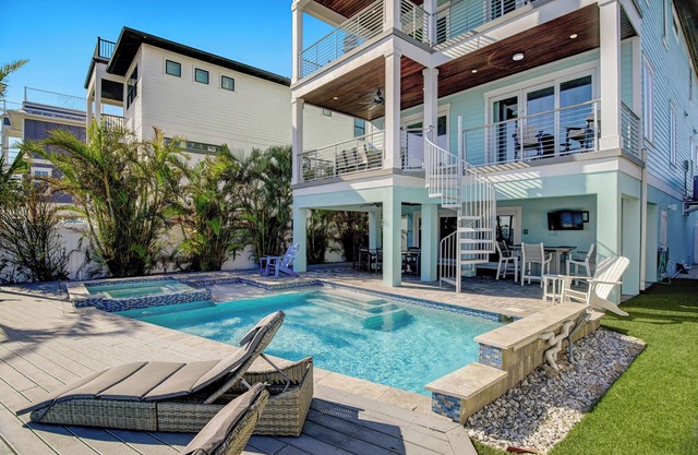 Gorgeous Waterfront Home with Pool, Dock, and Rooftop Deck! Short Walk to Beach!
