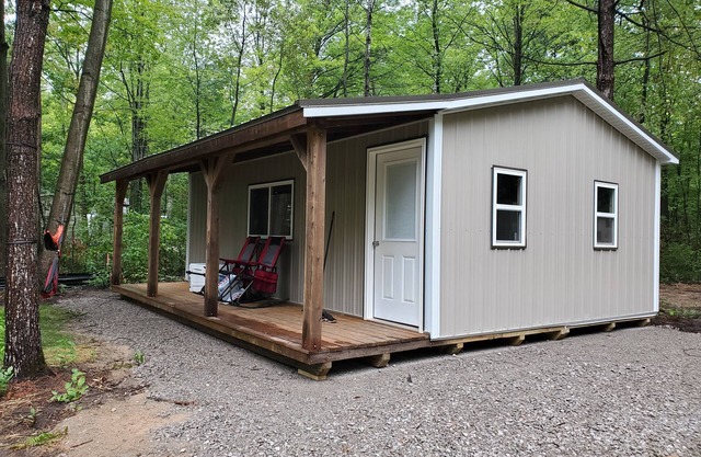 Great camping location will full hook up and tiny guest house!