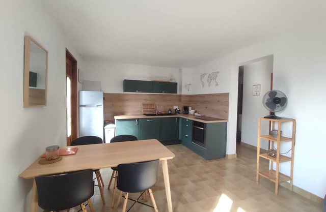 Ground floor apartment in a house at the foot of Grand Colombier