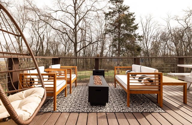 HangingEggChair~FirePit~HugeYard~Mural~King'sIsland~CincyTheme~Grasswall