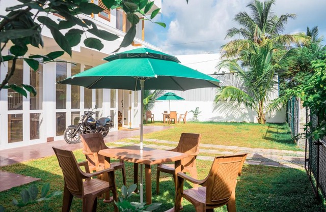 Happy Hours Guest House & Restaurant