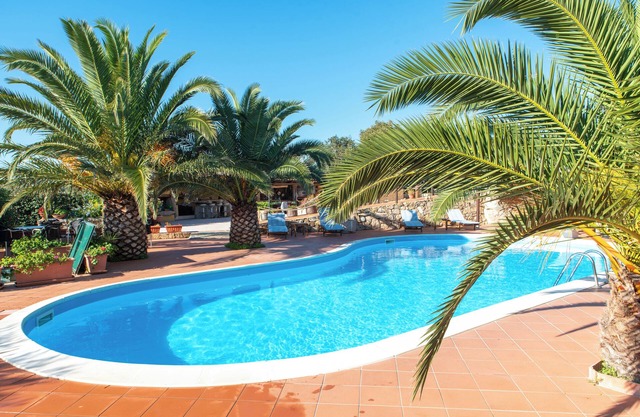 Holiday Apartment "Villa Smeralda" with Italian Atmosphere and Shared Pool