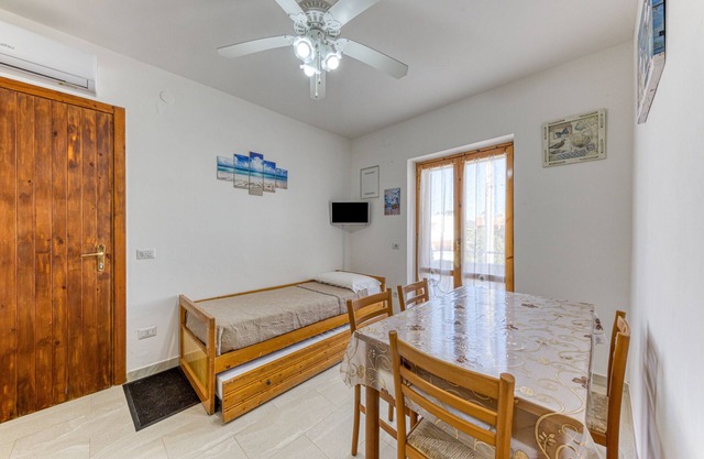Holiday Home 'Appartamento A 50 M Dal Mare' with Balcony and Air Conditioning