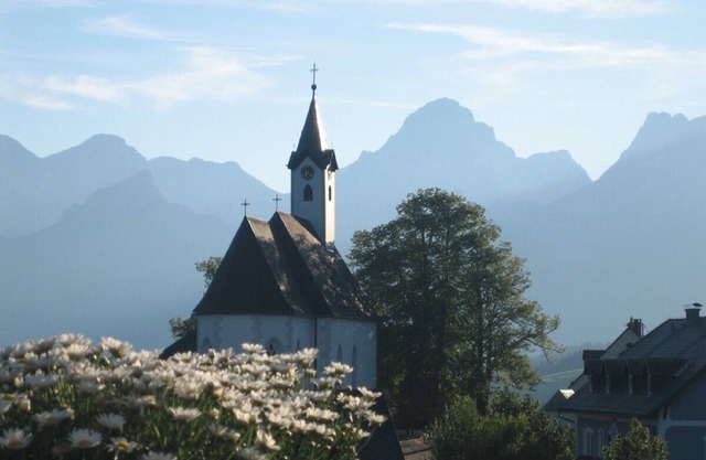 Holiday home in a mountain village with a fantastic mountain backdrop