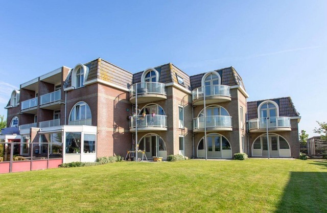 Holiday home Residenz Polderblick 16 in Burgerbrug. Suitable for 4 people, 2 bedrooms.