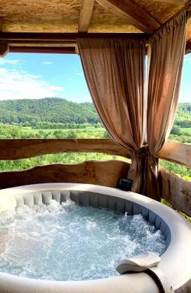 Holiday home with hot tube, near the river