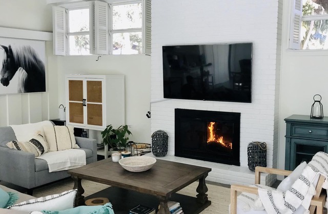 Home Gem! Heated pool, lush backyard a block from the ocean on Central Beach!