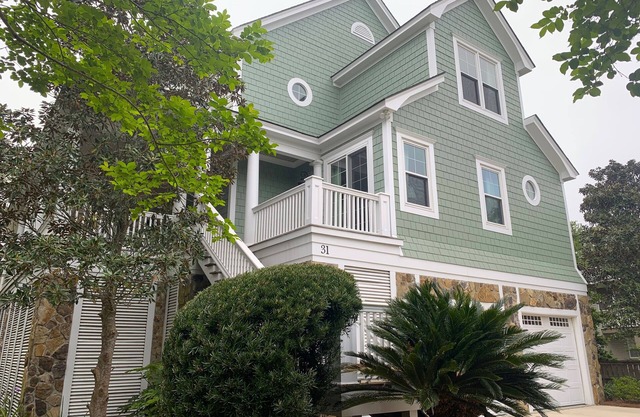 Home with covered porch, decks & private pool at North Litchfield Beach.