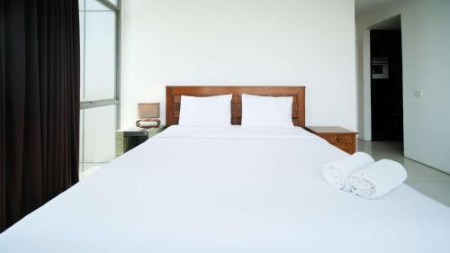 Homey 1BR with Extra Room Apartment at Aryaduta Residence Surabaya By Travelio
