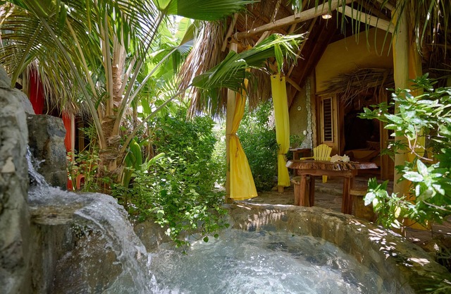 Honeymoon yellow-sun cabin #3, at Chalet Tropical bio-hotel