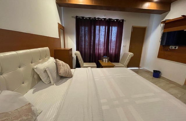 Hotel Atithi, Near Yes Bank, Mall Road, Mussoorie