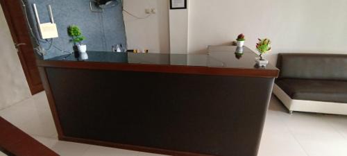 Hotel O Fanilly Guest House MarabahanNearJembatan Rumpiang