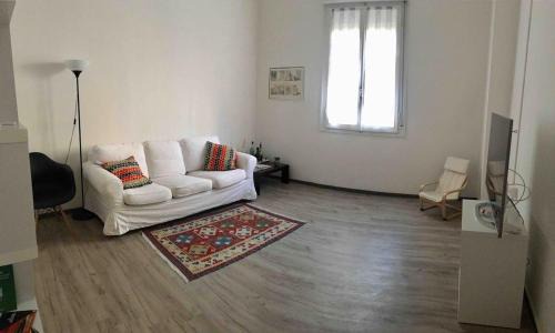 In the center of Modena, Piazza Roma and the Ferrari Museum