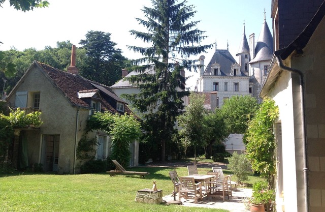 in the heart of a historic village of Touraine, with large garden and grove.